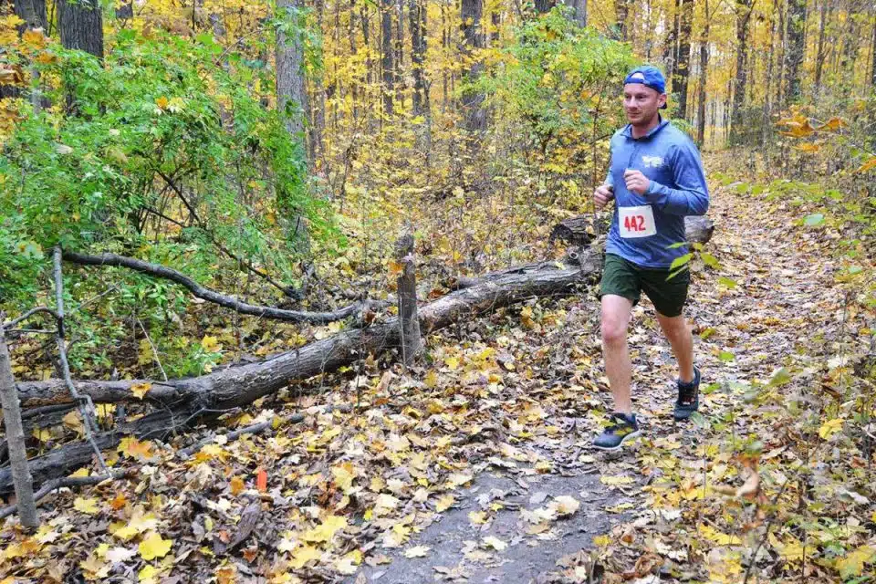 Lyle Schrock running on the Winona Lake trails